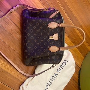 Louis Vuitton Rivoli MM canvas bag